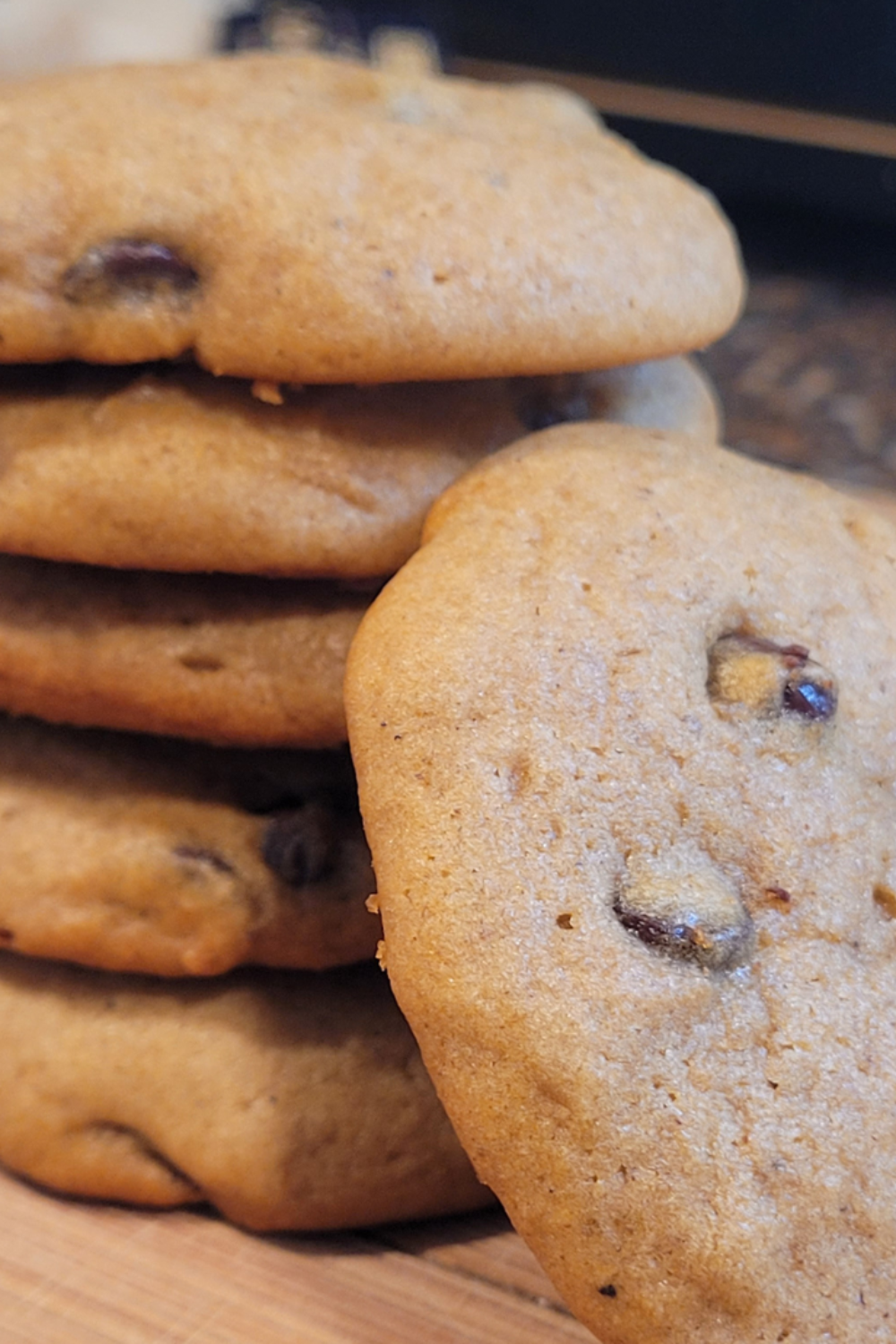Image illustrates sourdough pumpkin chocolate chip cookies.