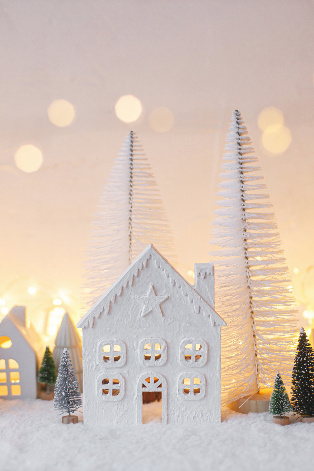 Image illustrates retro ceramic Christmas village decor for Christmas vintage decor.