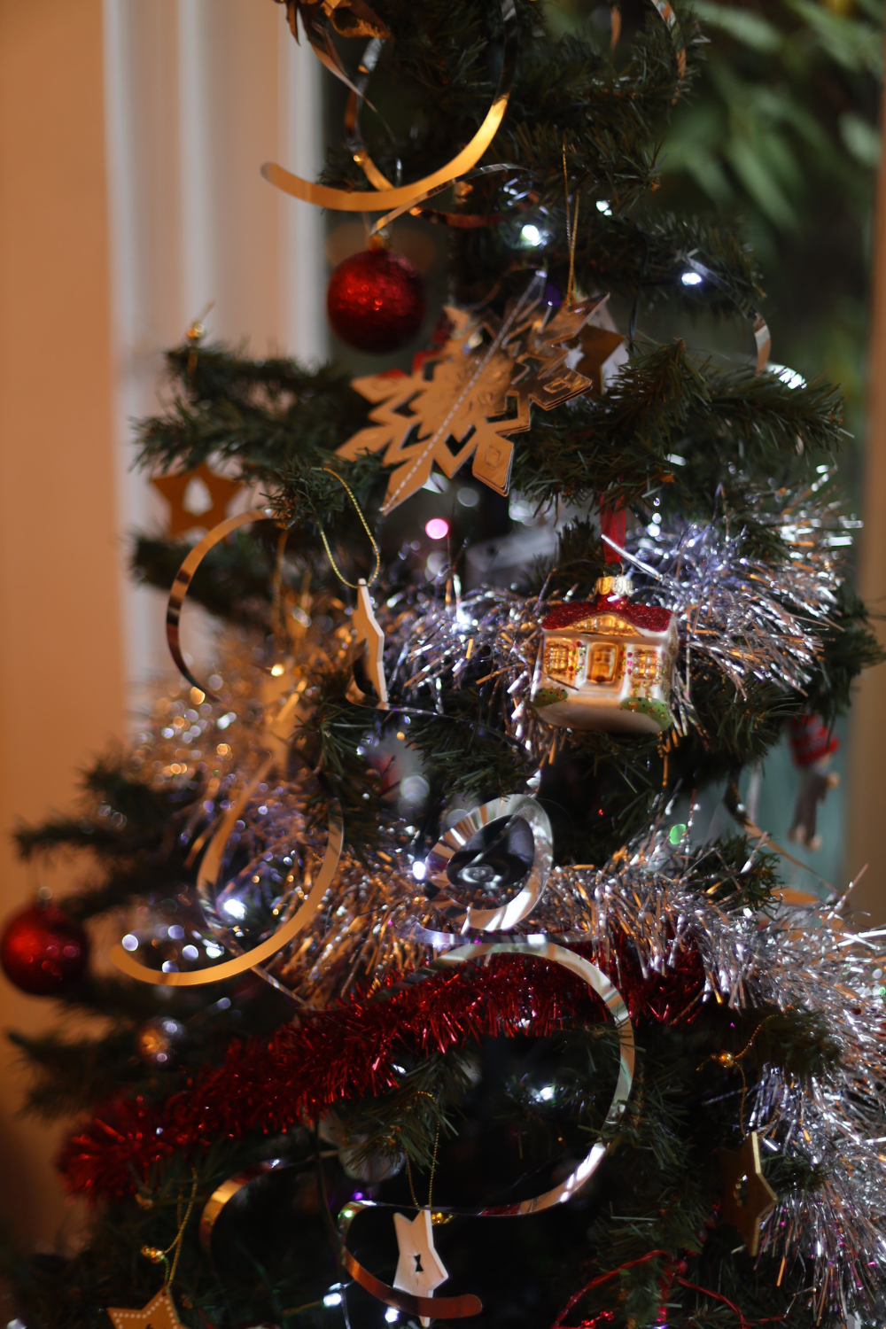 Image illustrates vintage tinsel garland for Christmas vintage decor.