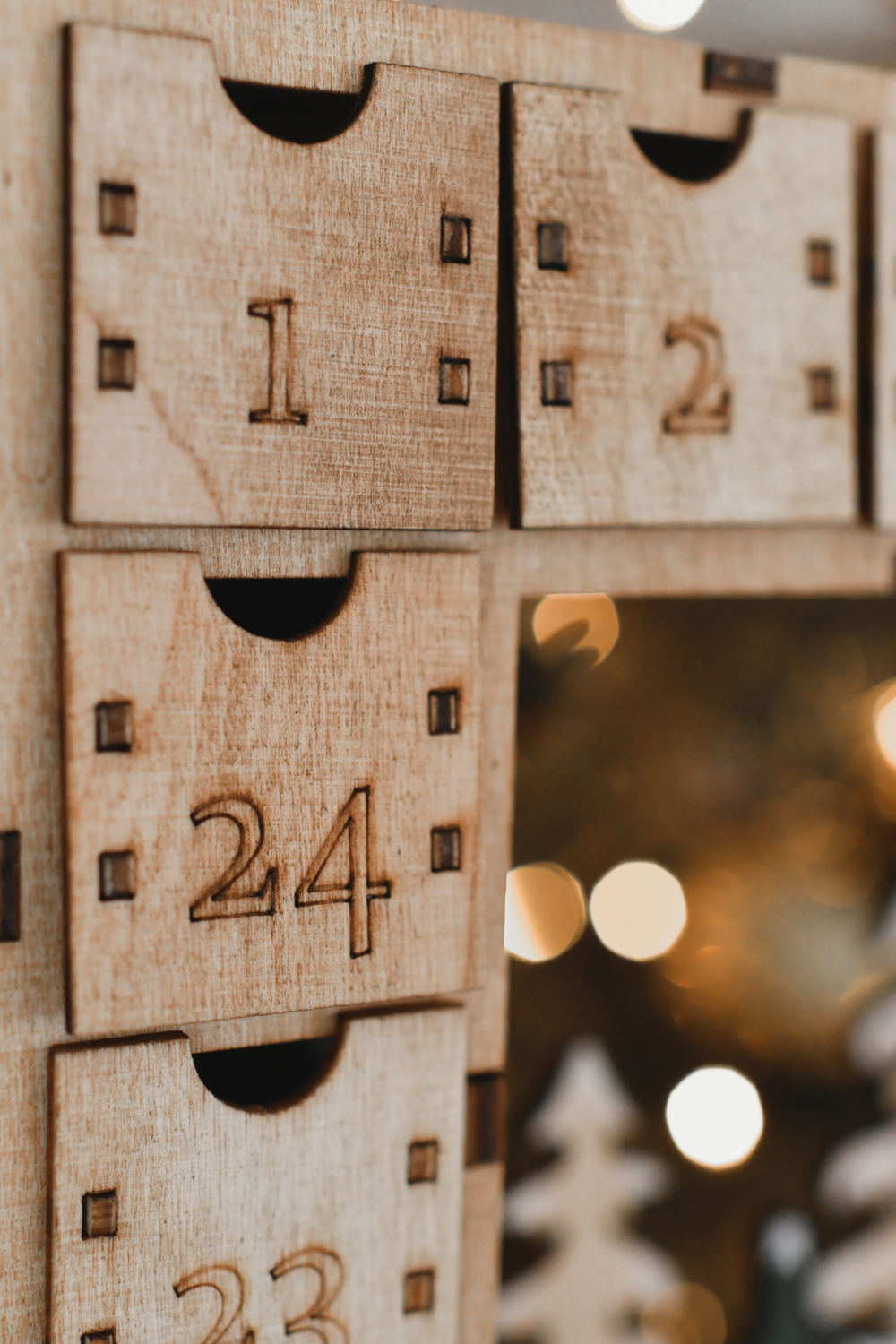 Image illustrates a wooden advent calender for Christmas vintage decor.