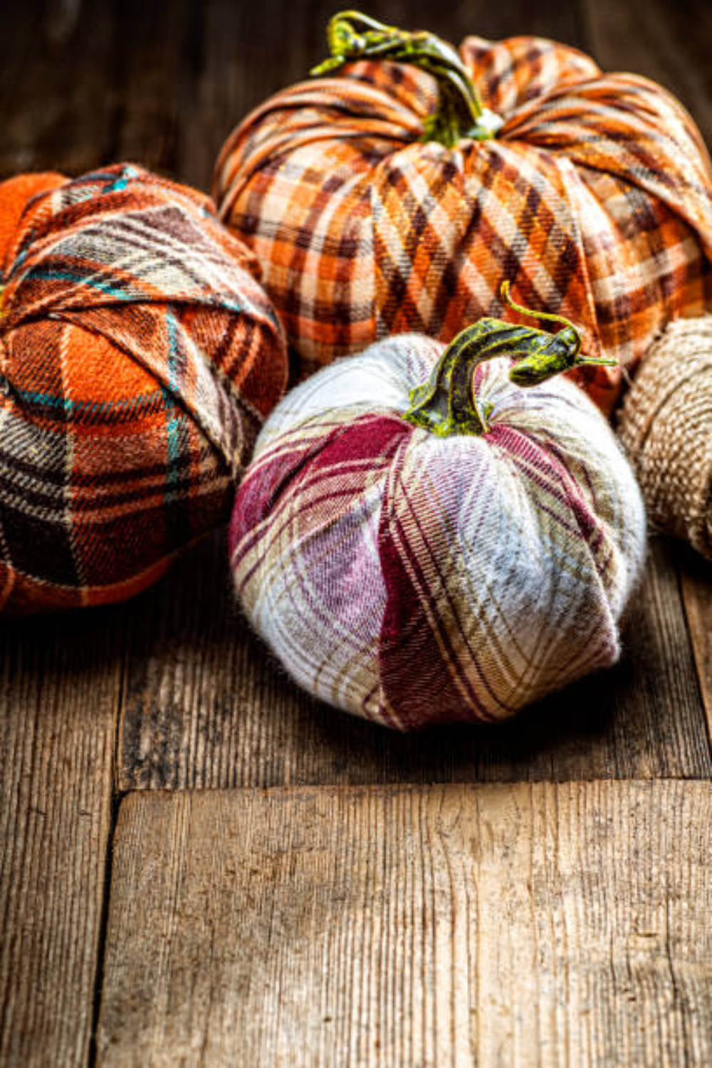 Image illustrates cozy plaid fabric pumpkins.