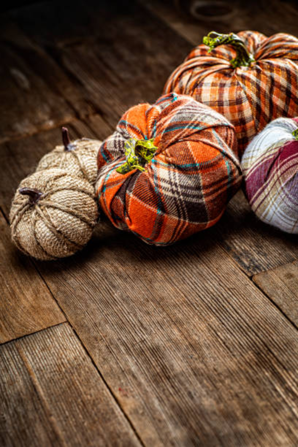 Image illustrates cozy plaid fabric pumpkins.