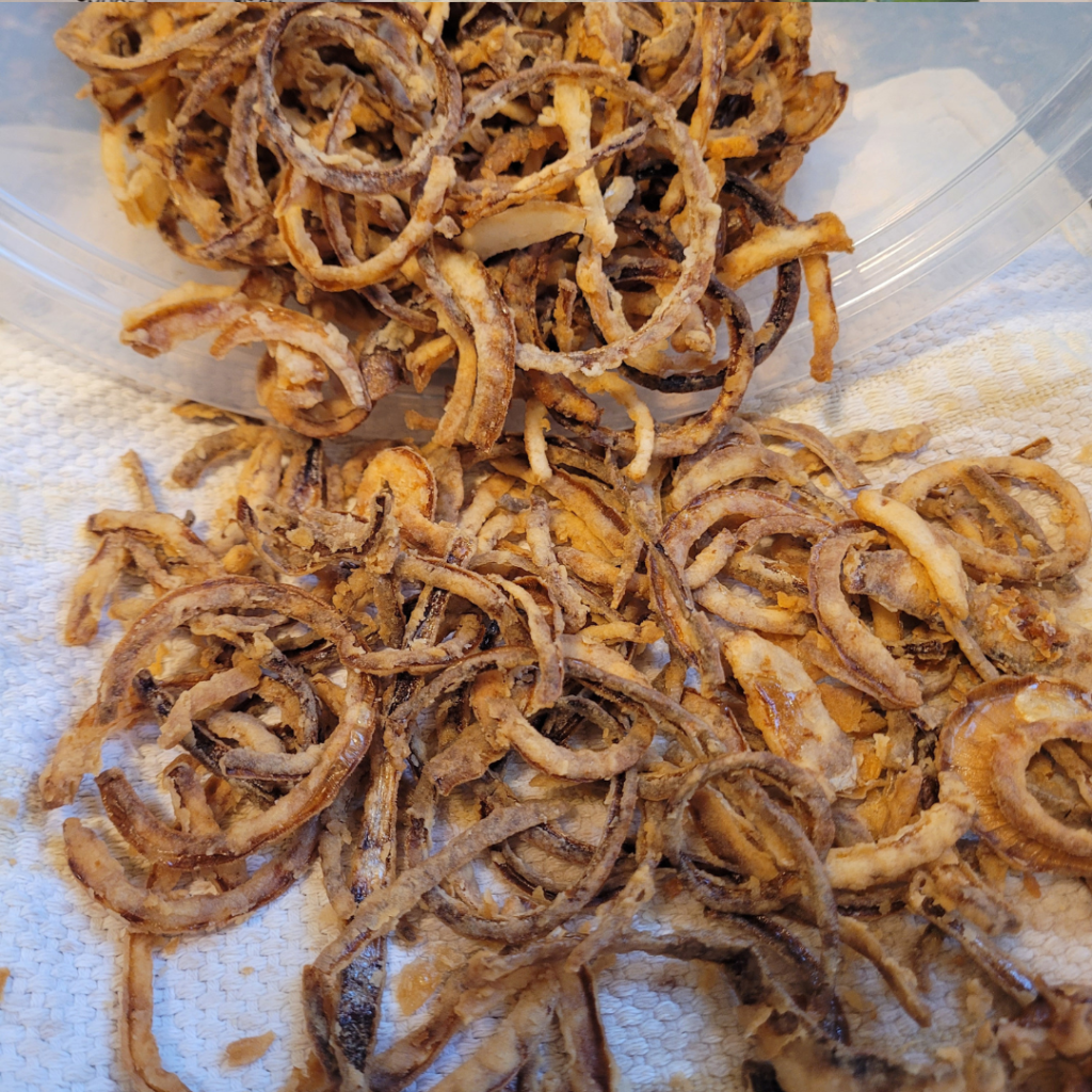 Image illustrates homemade fried onions.