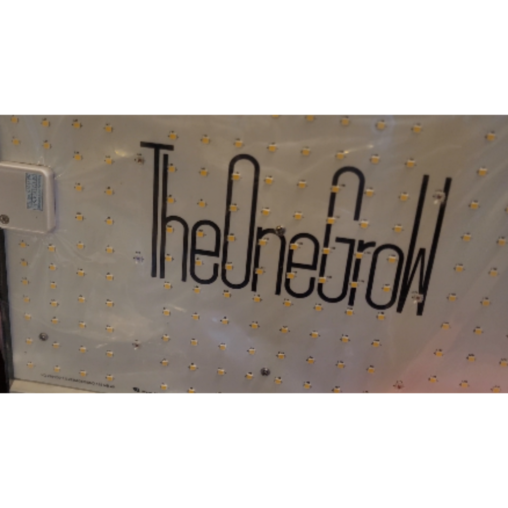 Image illustrates TheOneGrow grow light for my indoor plants.