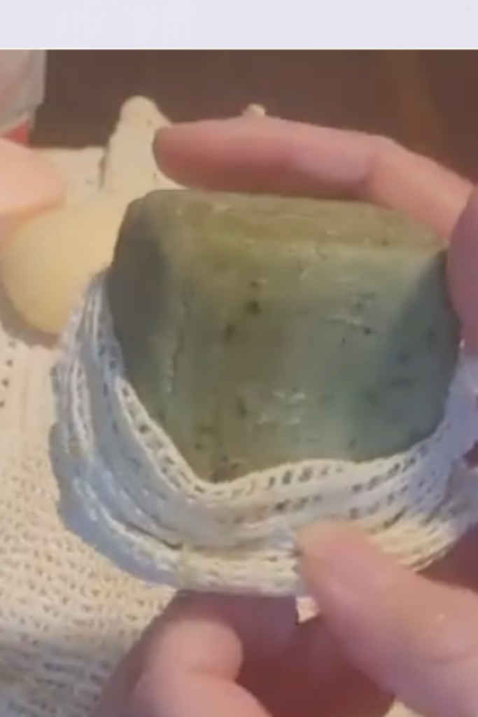 Image illustrates a soap saver bag.